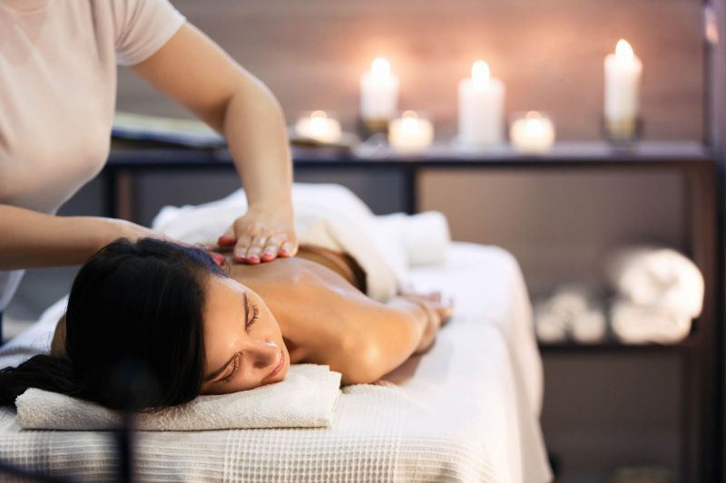 Woman receiving professional back massage in a spa